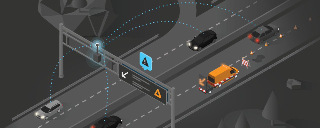 Roadside unit at variable message sign on a highway communicating with passing vehicles